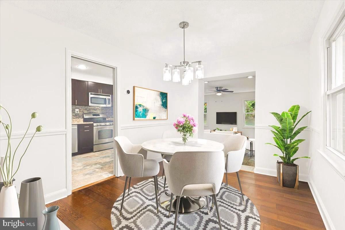 Dining room, Interior, Kitchen, Pendant Lights, Recessed Lighting, Stainless Steel Appliances, Wood Texture Flooring