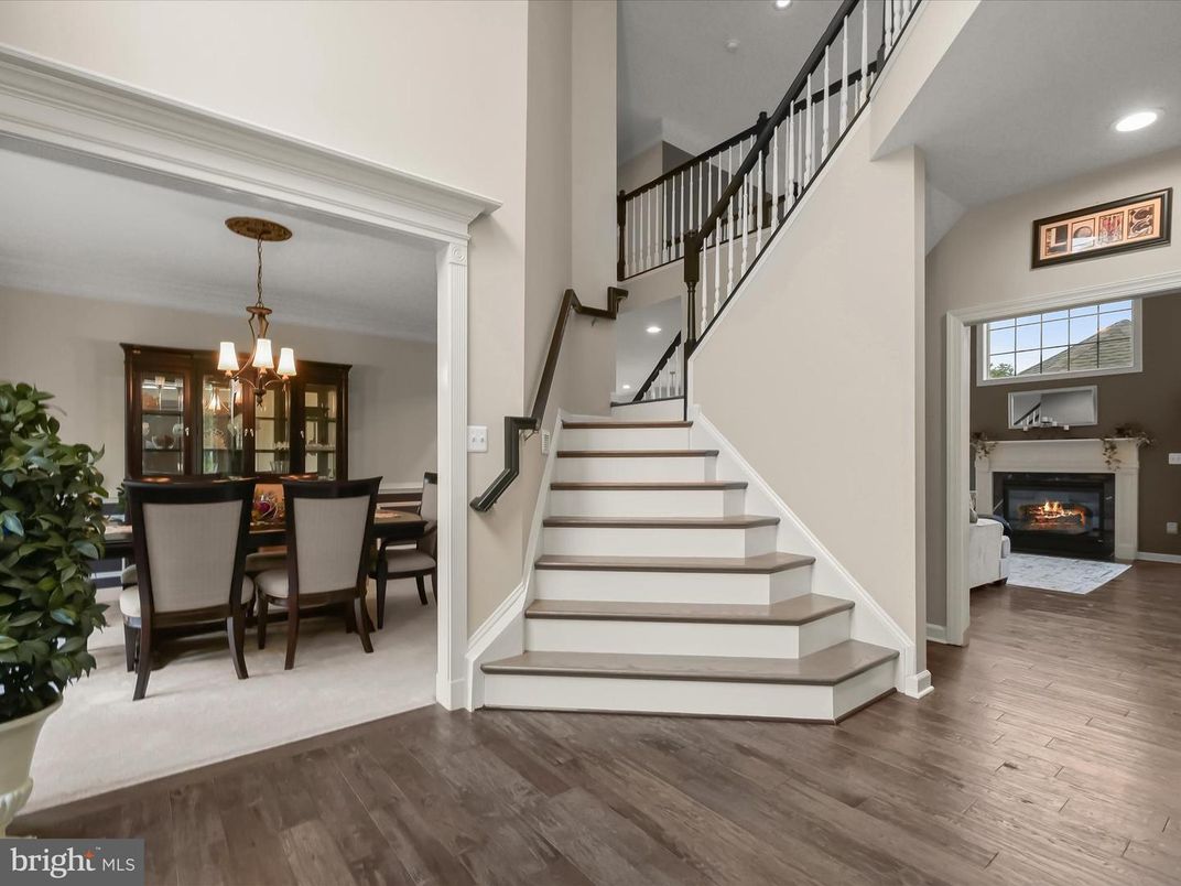Chandelier, Dining room, Fireplace, Interior, Recessed Lighting, Wood Texture Flooring