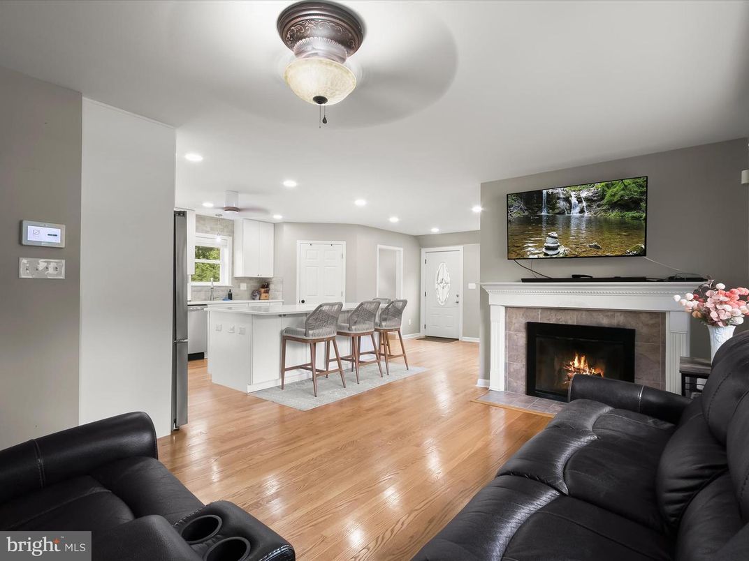 Fireplace, Interior, Kitchen, Living room, Recessed Lighting, Wood Texture Flooring