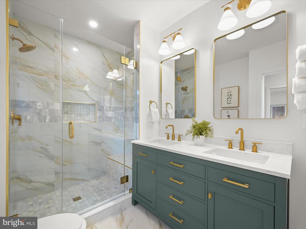 Bathroom, Dual Sink Vanities, Glass Shower, Interior, Marble, Marble Walls, Recessed Lighting