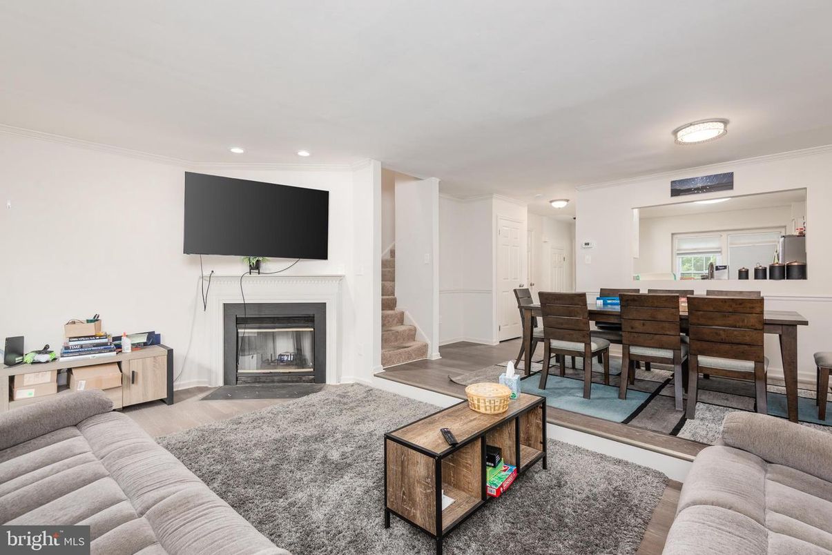 Dining room, Fireplace, Interior, Living room, Recessed Lighting, Wood Texture Flooring