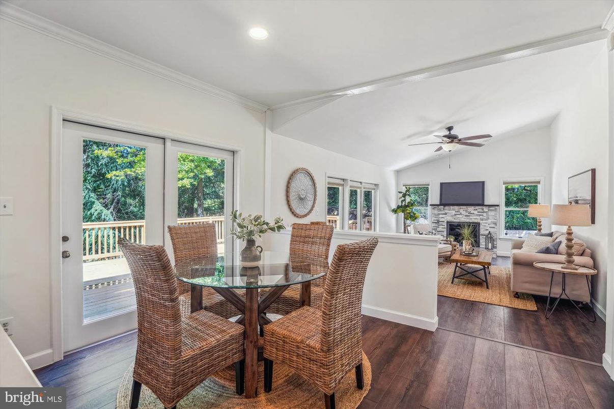 Dining room, Fireplace, Interior, Living room, Recessed Lighting, Wood Texture Flooring