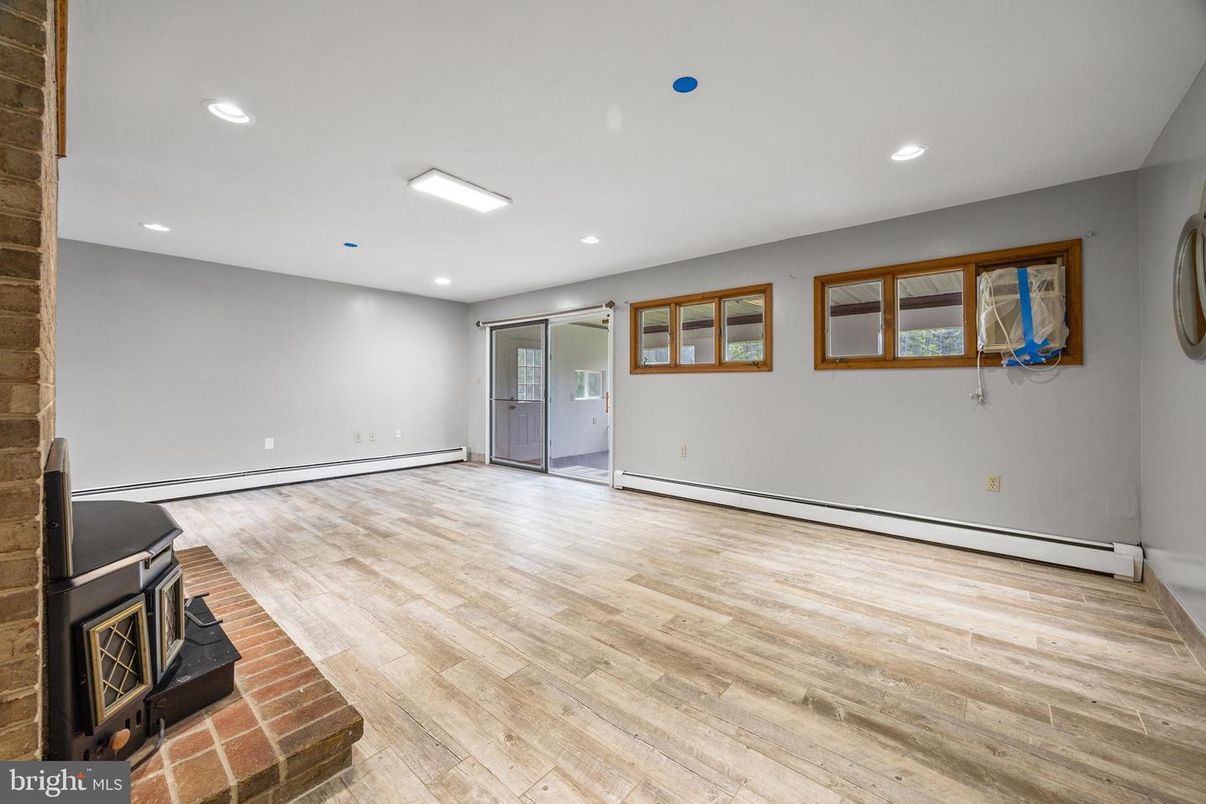 Empty room, Fireplace, Interior, Recessed Lighting, Wood Texture Flooring