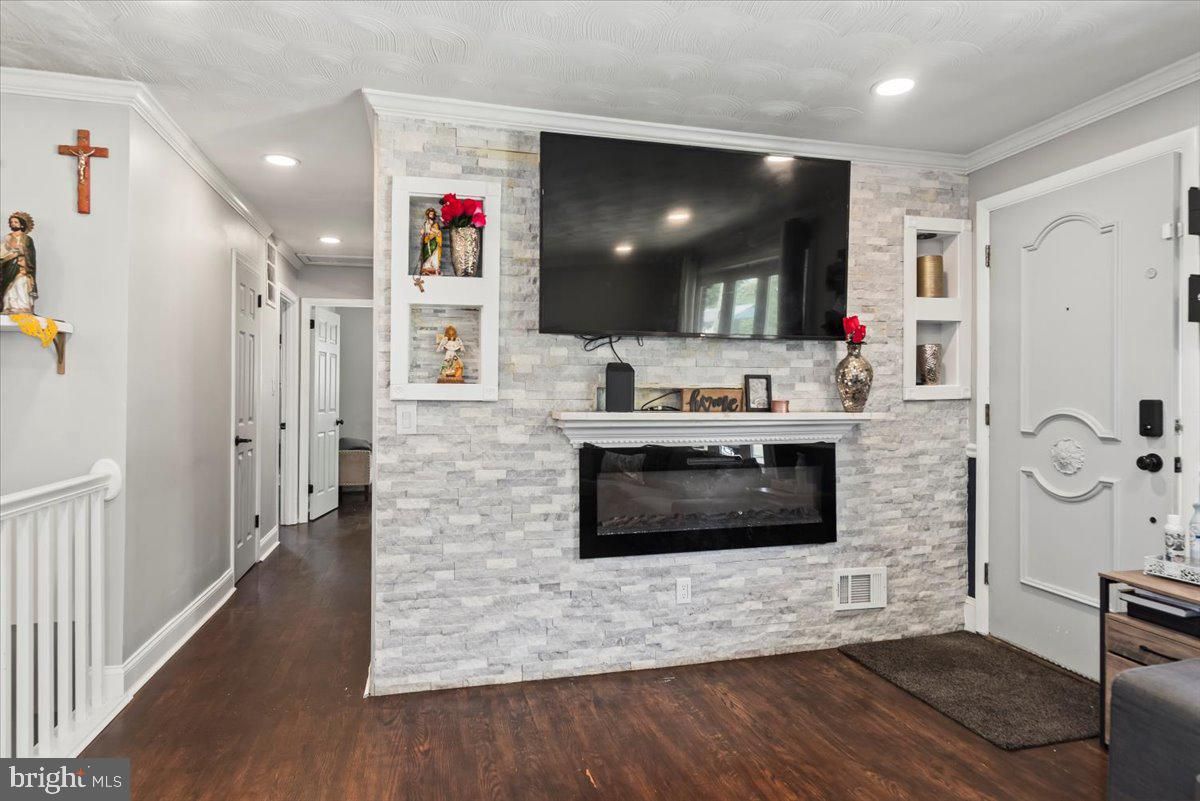 Fireplace, Interior, Recessed Lighting, Stone Walls, Wood Texture Flooring