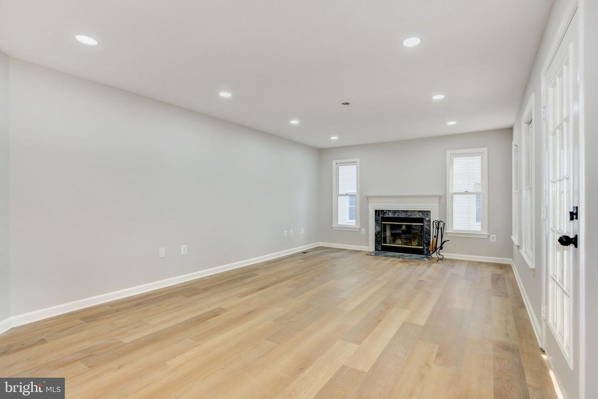 Empty room, Fireplace, Interior, Recessed Lighting, Wood Texture Flooring