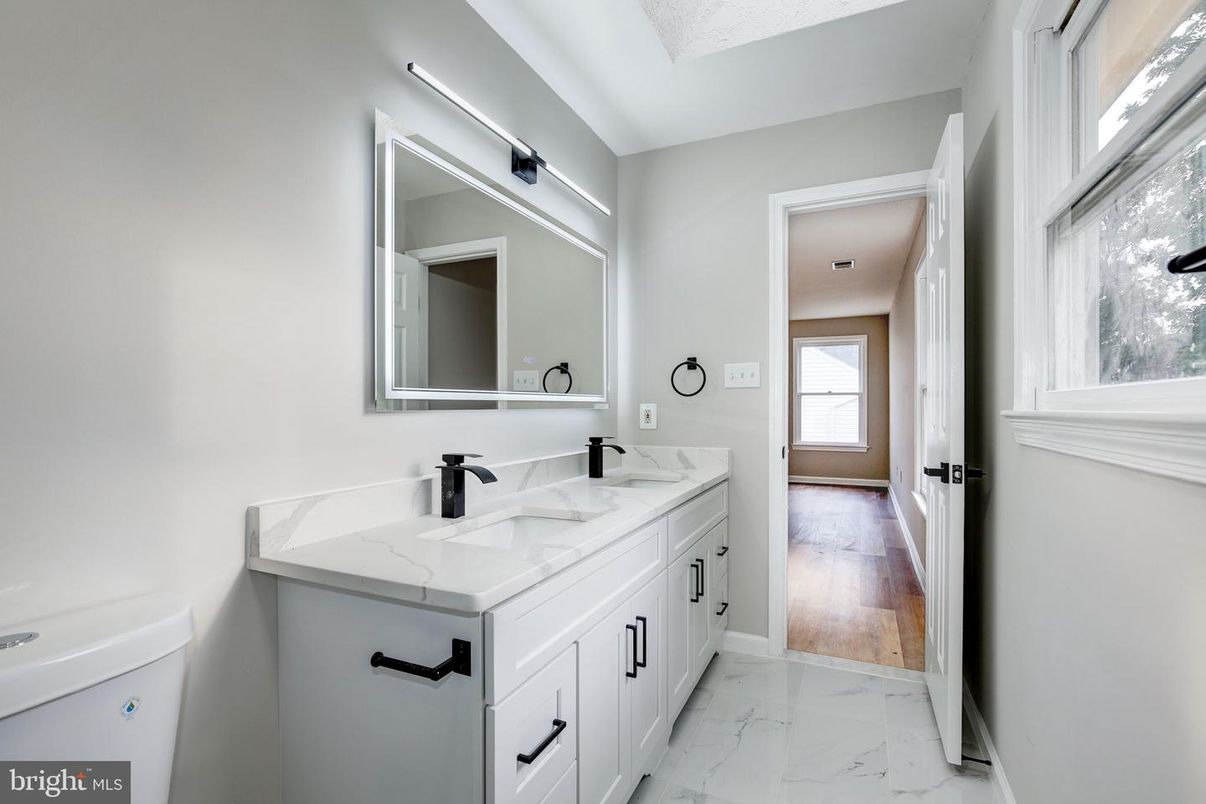 Bathroom, Dual Sink Vanities, Interior, Marble, Wood Texture Flooring