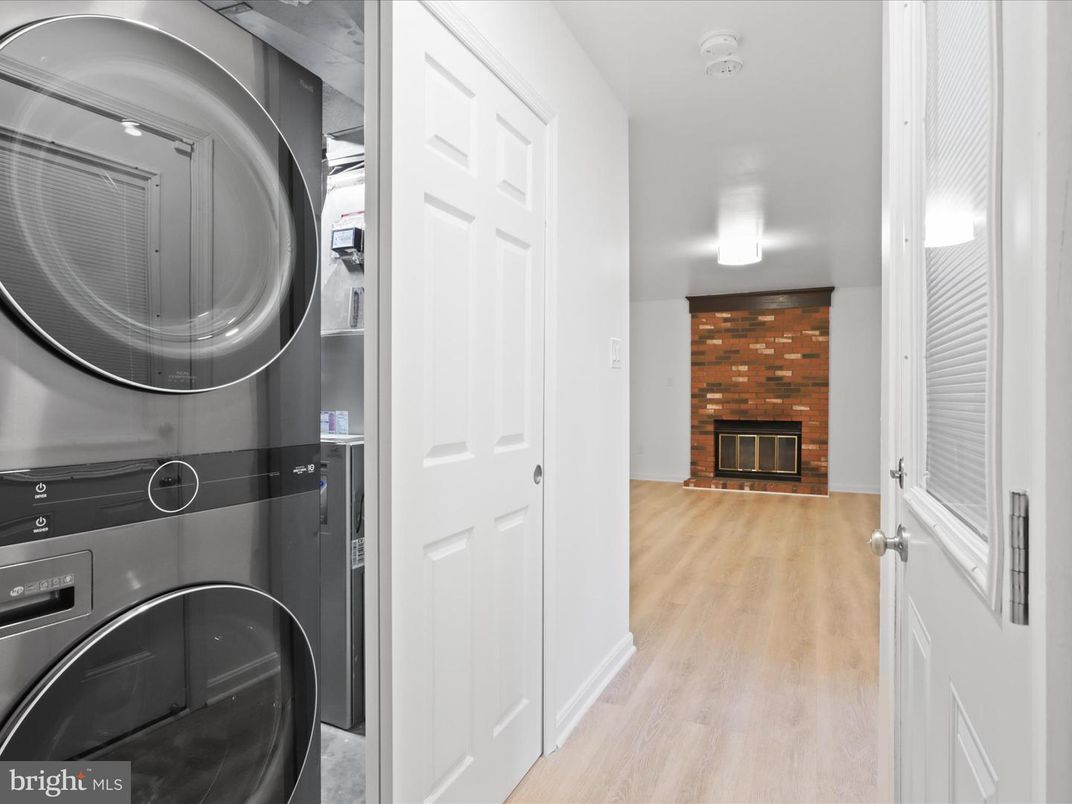 Fireplace, Interior, Stone Walls, Utility Closets, Washer, Wood Texture Flooring