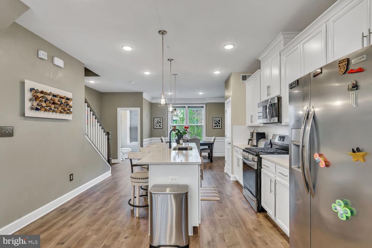 Dining room, Interior, Kitchen, Pendant Lights, Recessed Lighting, Stainless Steel Appliances, Wood Texture Flooring
