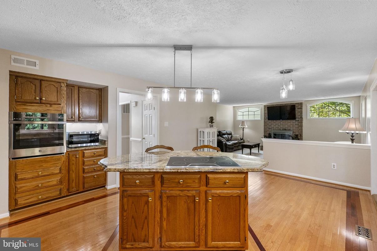 Fireplace, Interior, Kitchen, Pendant Lights, Wood Texture Flooring