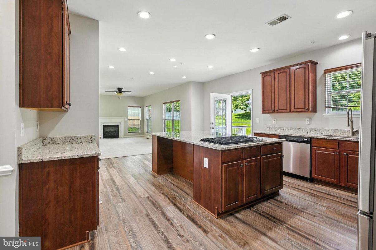 Fireplace, Interior, Kitchen, Recessed Lighting, Wood Texture Flooring