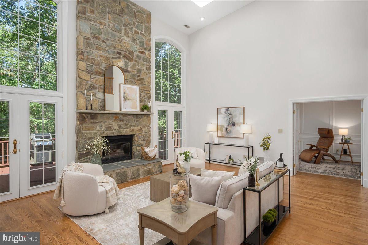Fireplace, Interior, Living room, Recessed Lighting, Stone Walls, Wood Texture Flooring