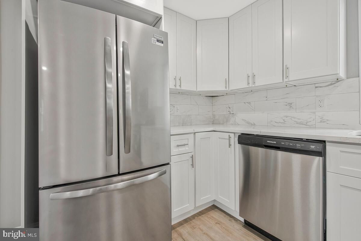 Interior, Kitchen, Marble Walls, Stainless Steel Appliances, Wood Texture Flooring
