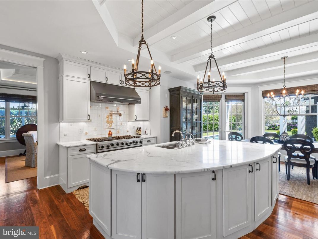 Chandelier, Dining room, Interior, Kitchen, Pendant Lights, Recessed Lighting, Stainless Steel Appliances, Wood Texture Flooring