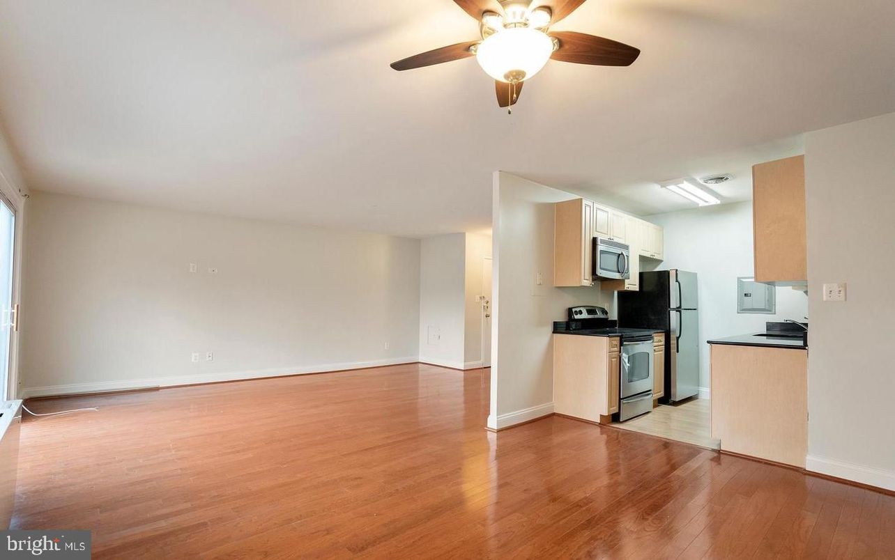 Empty room, Interior, Kitchen, Stainless Steel Appliances, Wood Texture Flooring
