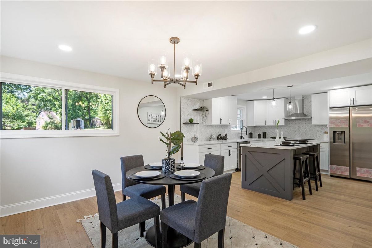Chandelier, Dining room, Interior, Kitchen, Pendant Lights, Recessed Lighting, Stainless Steel Appliances, Wood Texture Flooring