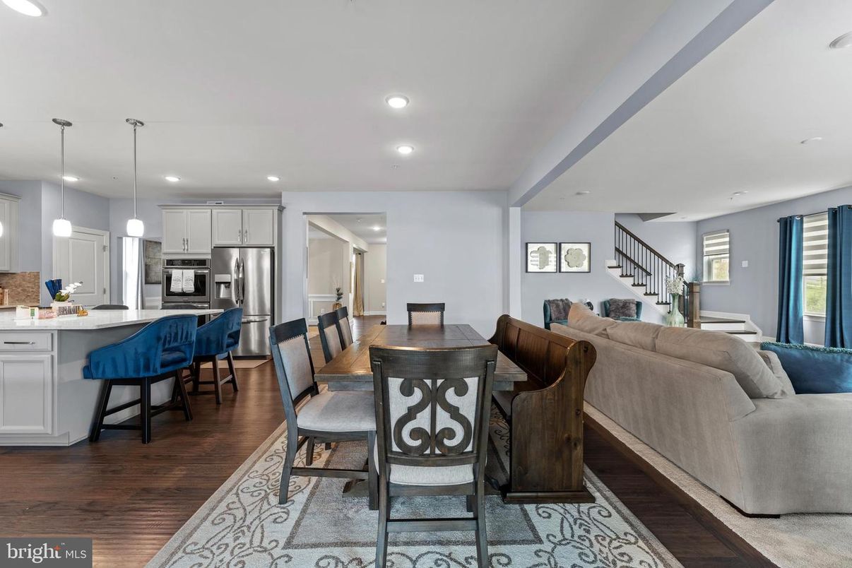 Dining room, Interior, Kitchen, Living room, Pendant Lights, Recessed Lighting, Stainless Steel Appliances, Wood Texture Flooring