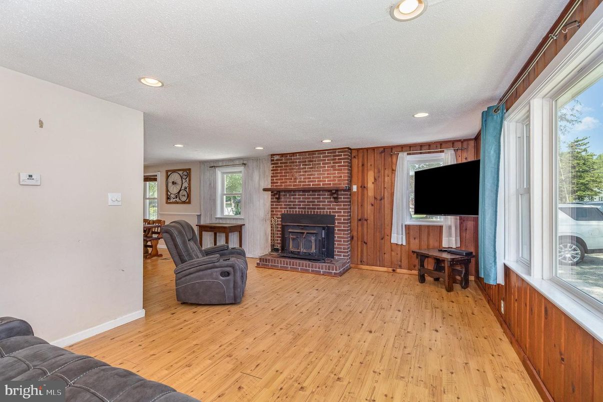 Fireplace, Interior, Recessed Lighting, Stone Walls, Wood Texture Flooring, Wooden Walls