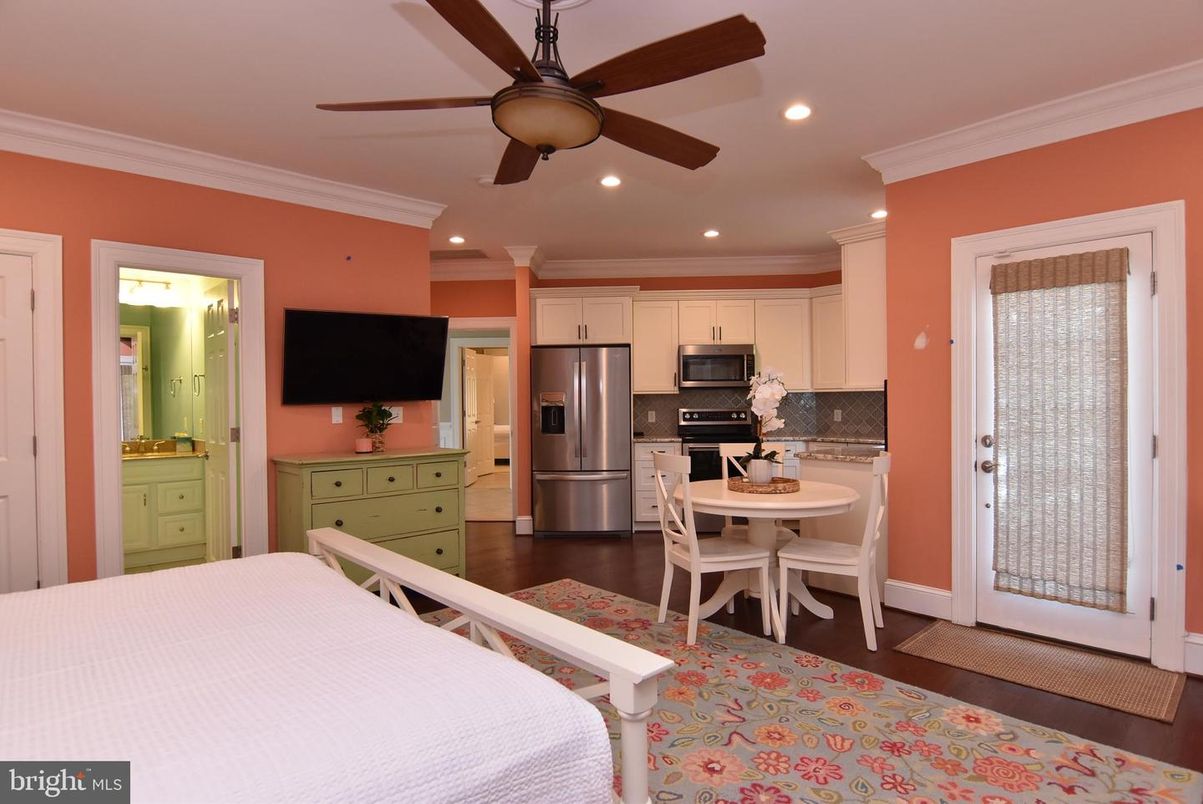 Bedroom, Dining room, Interior, Kitchen, Recessed Lighting, Stainless Steel Appliances, Wood Texture Flooring