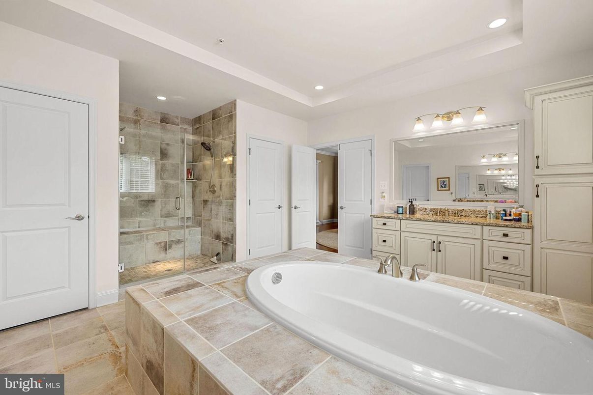 Bathroom, Dual Sink Vanities, Glass Shower, Interior, Recessed Lighting, Tile Countertops