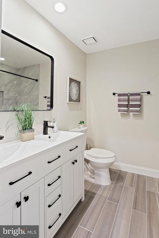 Bathroom, Dual Sink Vanities, Interior, Recessed Lighting, Wood Texture Flooring