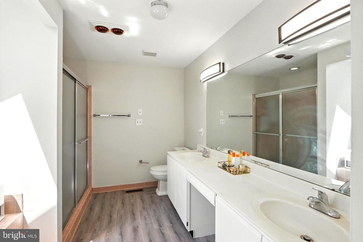 Bathroom, Dual Sink Vanities, Glass Shower, Interior, Recessed Lighting, Wood Texture Flooring
