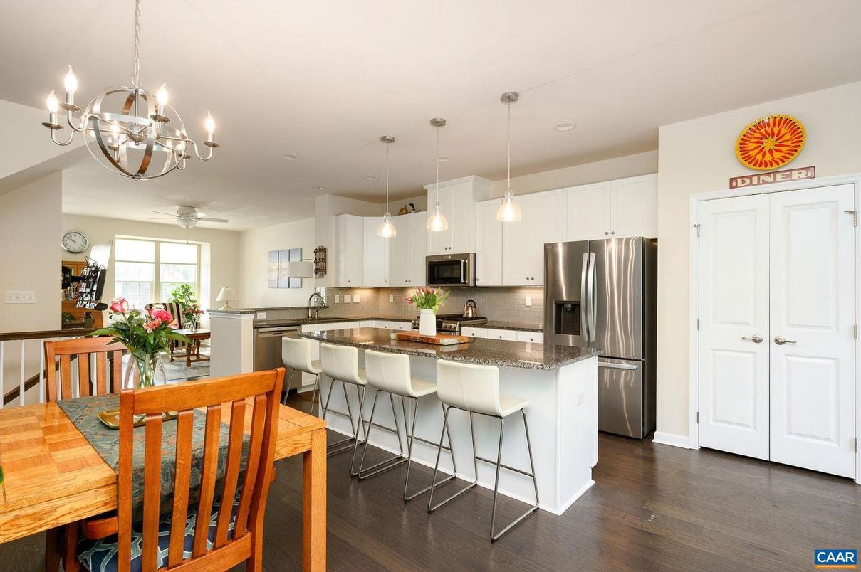 Chandelier, Dining room, Interior, Kitchen, Pendant Lights, Recessed Lighting, Stainless Steel Appliances, Wood Texture Flooring
