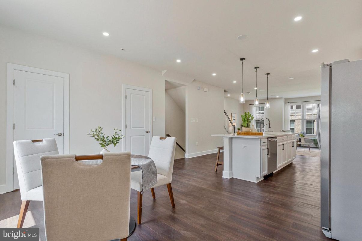 Dining room, Interior, Kitchen, Pendant Lights, Recessed Lighting, Stainless Steel Appliances, Wood Texture Flooring