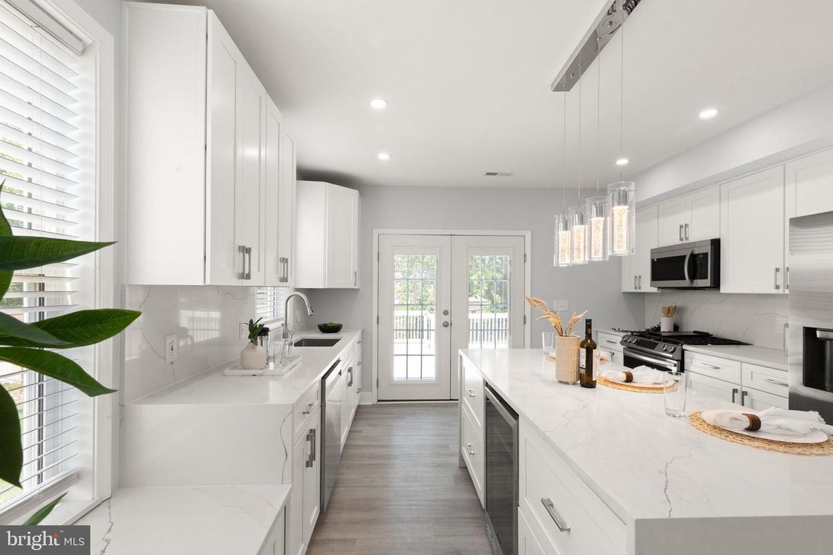 Interior, Kitchen, Pendant Lights, Recessed Lighting, Stainless Steel Appliances, Wood Texture Flooring