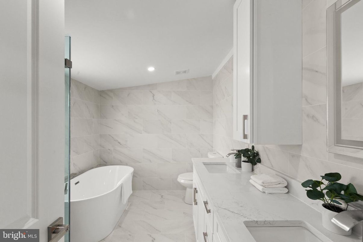 Bathroom, Dual Sink Vanities, Free Standing Baths, Interior, Marble, Marble Walls, Recessed Lighting