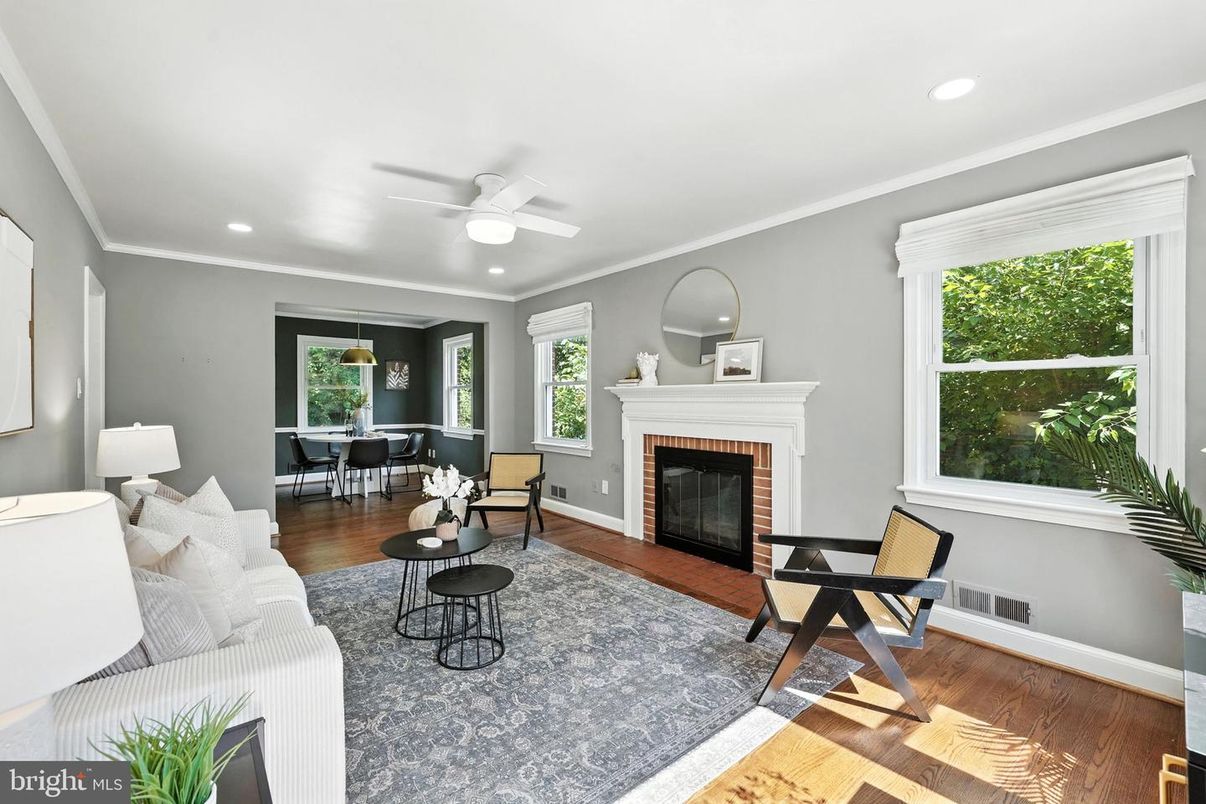 Dining room, Fireplace, Interior, Living room, Recessed Lighting, Wood Texture Flooring