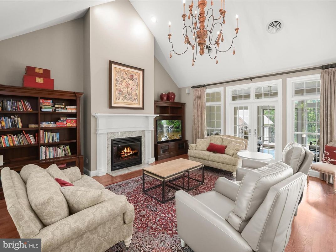 Chandelier, Fireplace, Interior, Living room, Recessed Lighting, Wood Texture Flooring