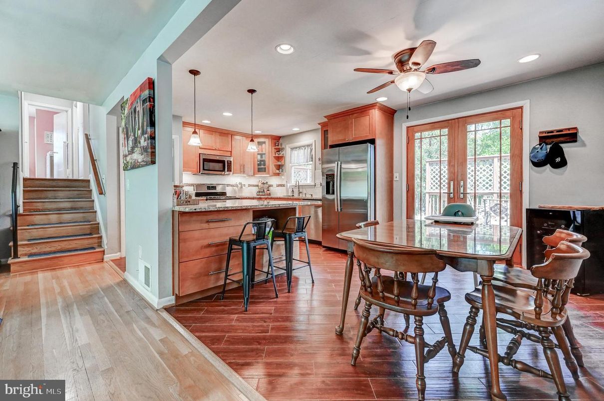Dining room, Interior, Kitchen, Pendant Lights, Recessed Lighting, Stainless Steel Appliances, Wood Texture Flooring