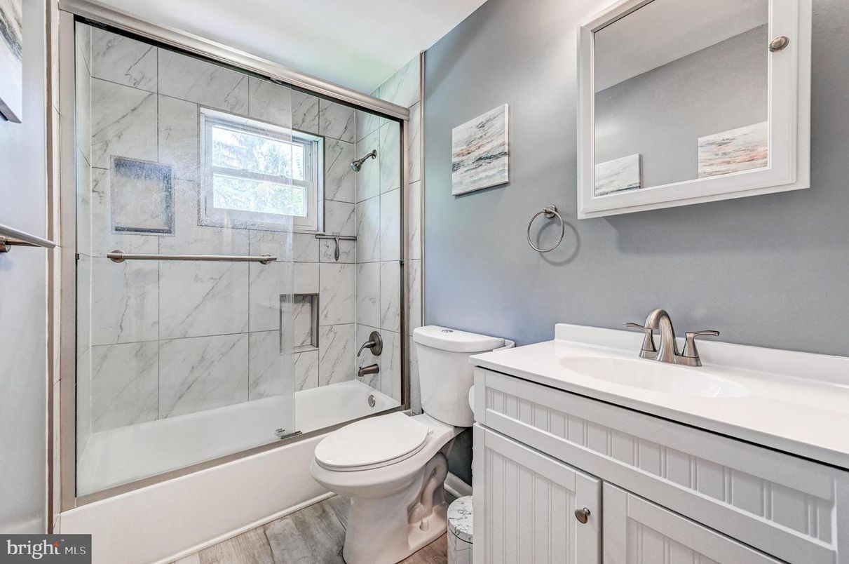 Bathroom, Glass Shower, Interior, Marble Walls, Wood Texture Flooring