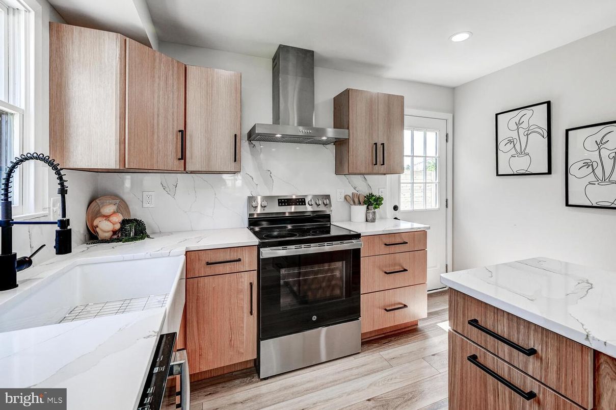 Interior, Kitchen, Marble Walls, Recessed Lighting, Stainless Steel Appliances, Wood Texture Flooring