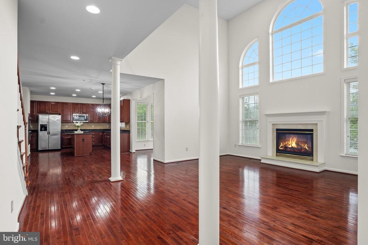 Fireplace, Interior, Kitchen, Pendant Lights, Recessed Lighting, Stainless Steel Appliances, Wood Texture Flooring