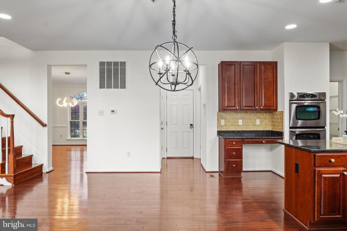 Chandelier, Interior, Kitchen, Pendant Lights, Recessed Lighting, Stainless Steel Appliances, Wood Texture Flooring