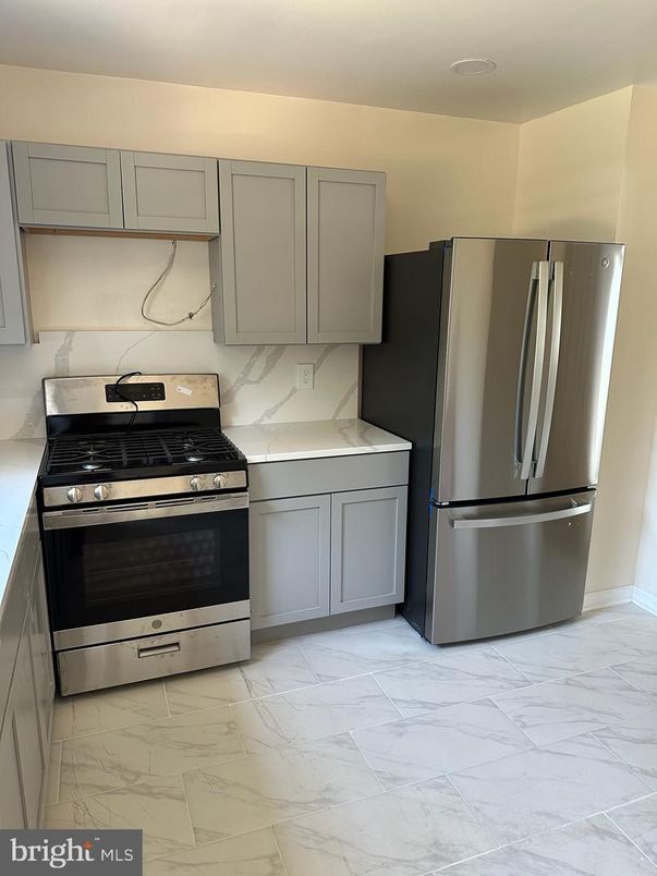 Interior, Kitchen, Marble, Marble Walls, Stainless Steel Appliances