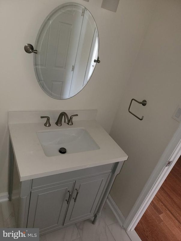 Bathroom, Dual Sink Vanities, Interior, Marble, Wood Texture Flooring