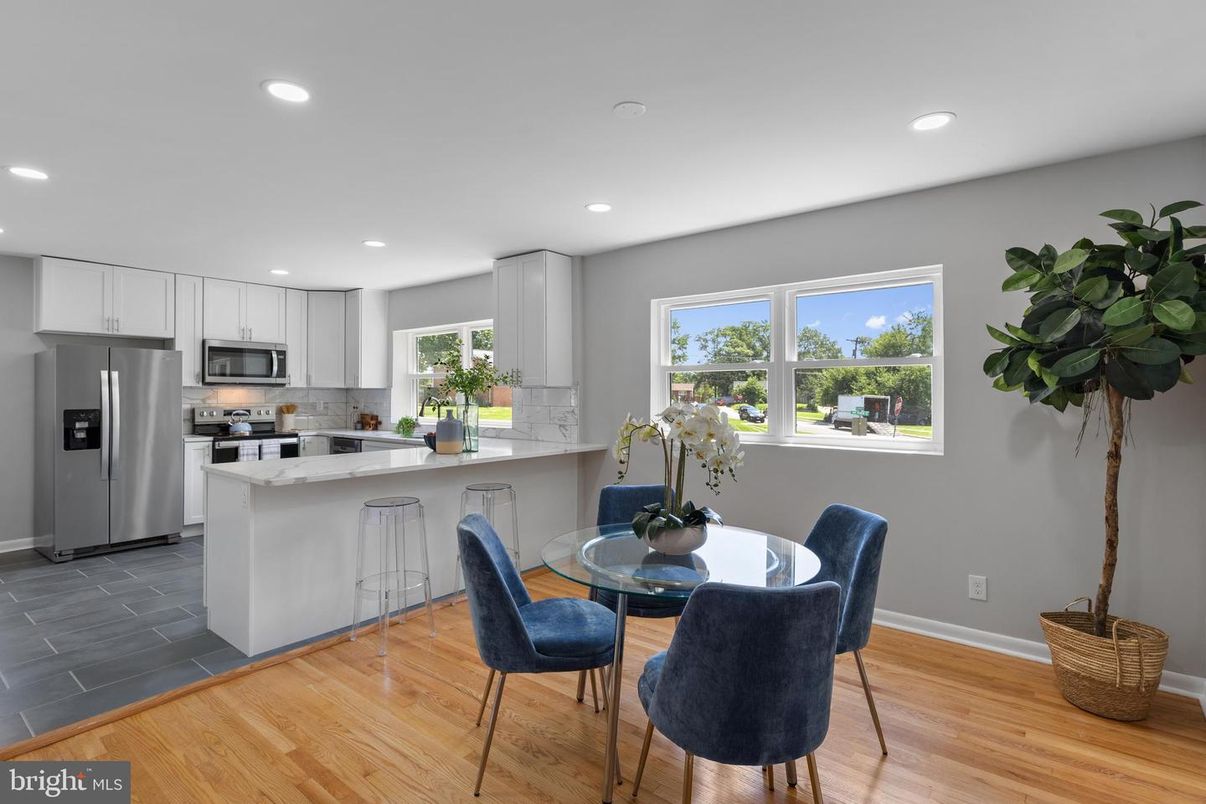 Dining room, Interior, Kitchen, Recessed Lighting, Stainless Steel Appliances, Wood Texture Flooring