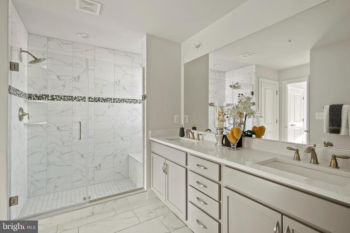 Bathroom, Dual Sink Vanities, Glass Shower, Interior, Marble, Marble Walls, Recessed Lighting