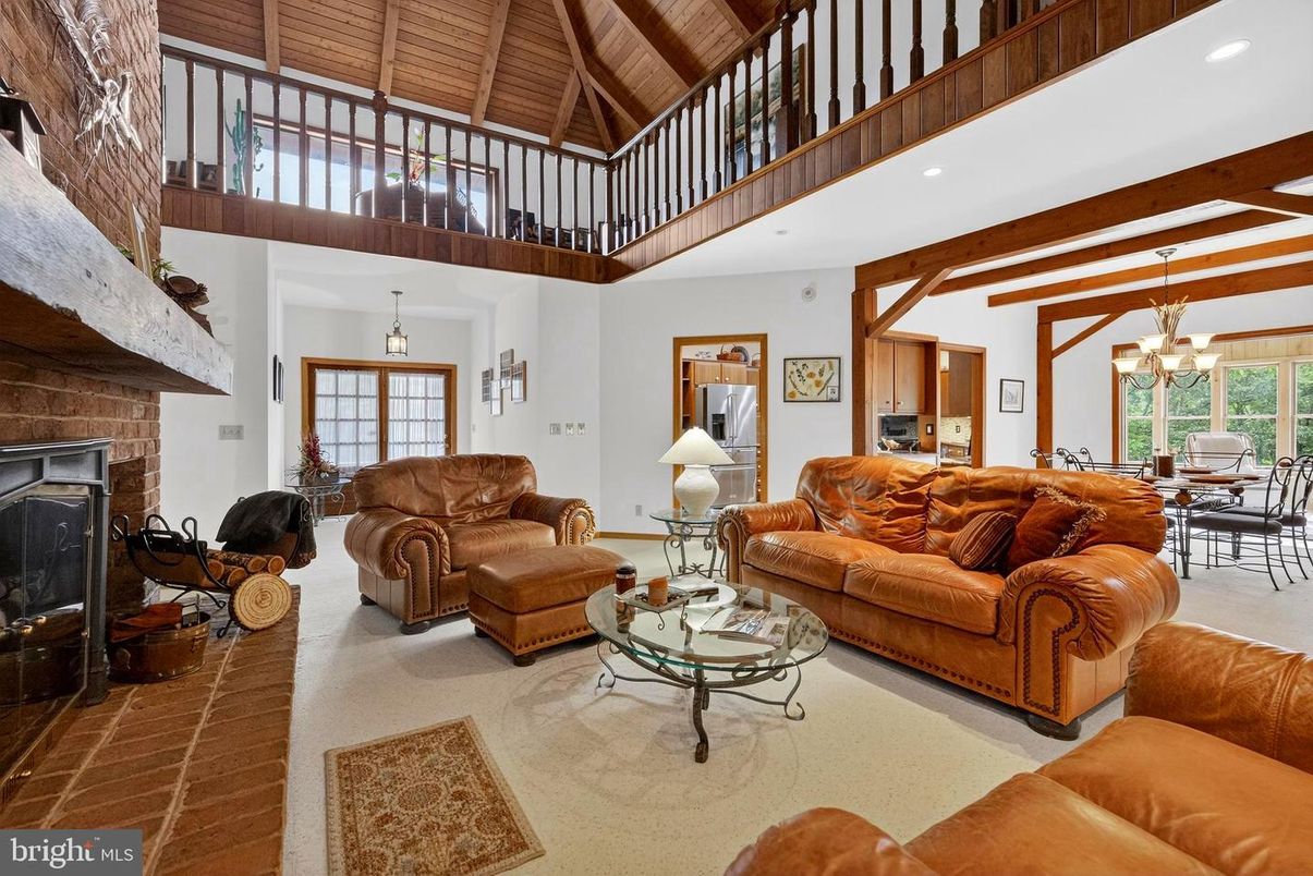 Chandelier, Dining room, Fireplace, Interior, Living room, Pendant Lights, Recessed Lighting, Wooden Beams, Wooden Ceilings