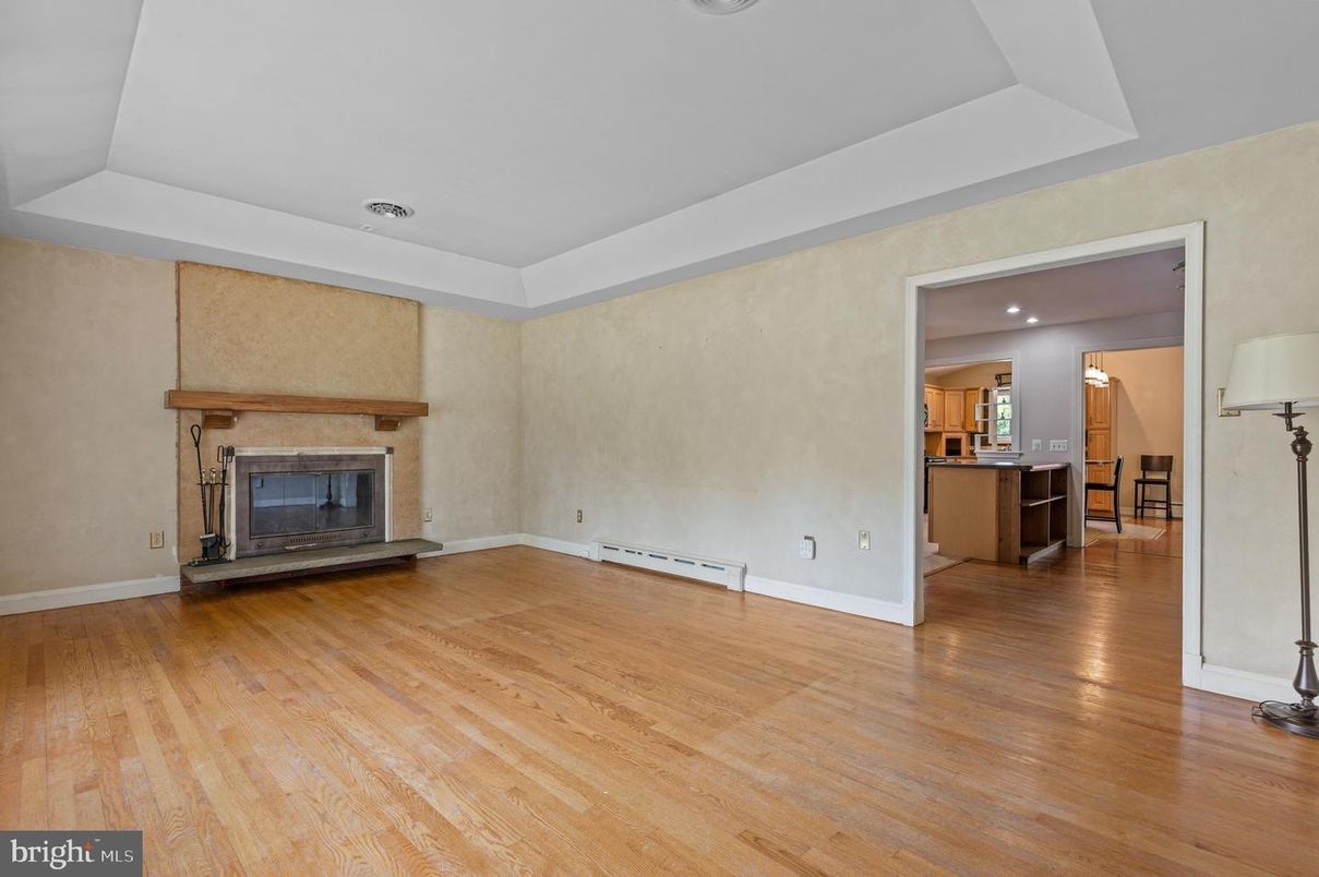 Empty room, Fireplace, Interior, Kitchen, Recessed Lighting, Wood Texture Flooring