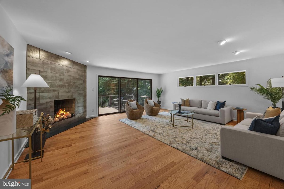 Fireplace, Interior, Living room, Recessed Lighting, Stone Walls, Wood Texture Flooring