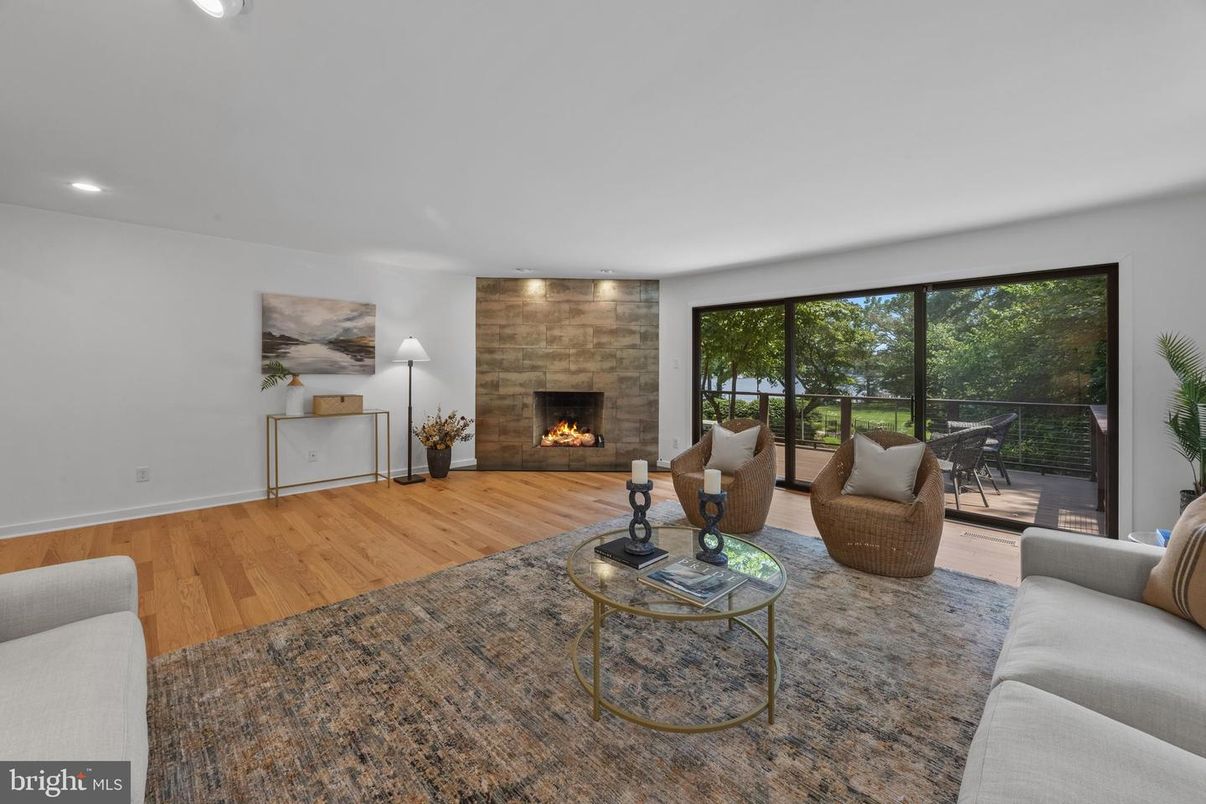 Fireplace, Interior, Living room, Recessed Lighting, Stone Walls, Wood Texture Flooring