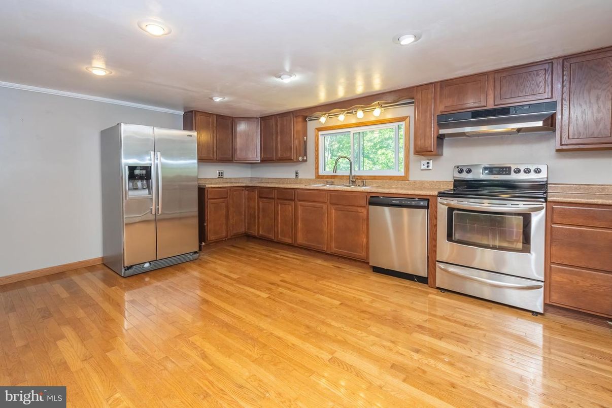 Interior, Kitchen, Recessed Lighting, Stainless Steel Appliances, Wood Texture Flooring