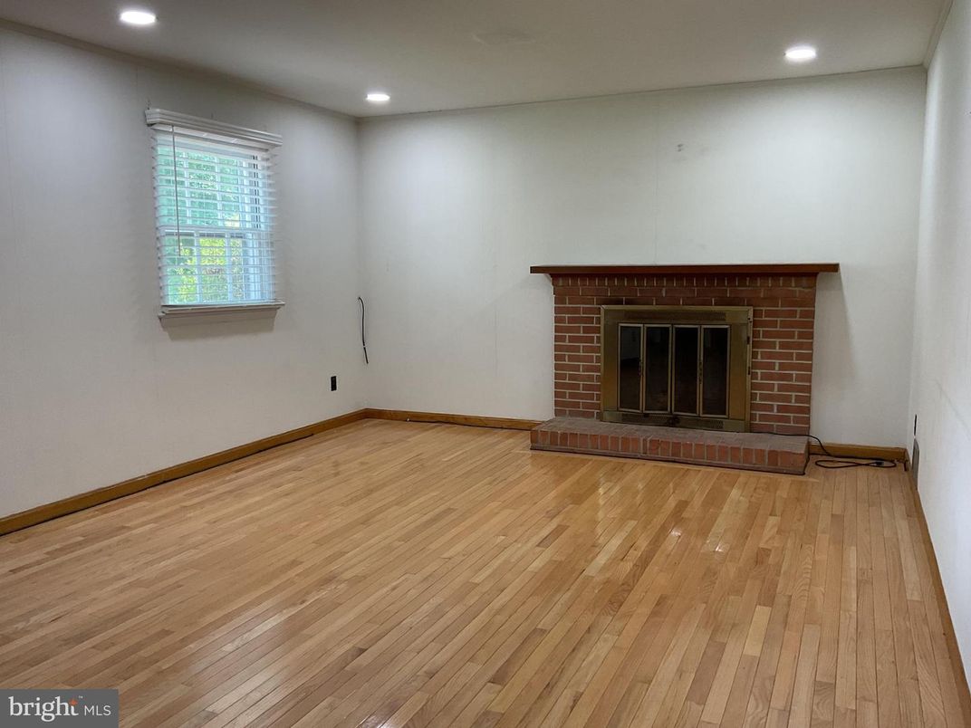 Empty room, Fireplace, Interior, Recessed Lighting, Wood Texture Flooring