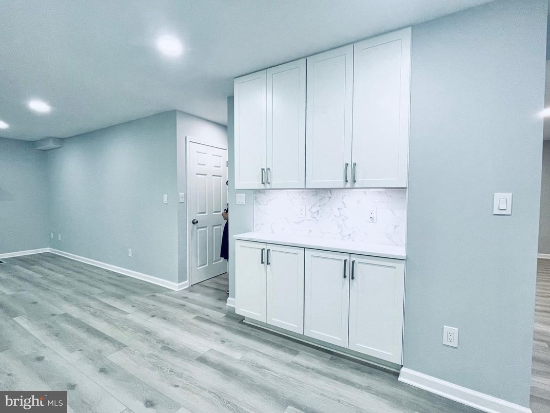 Interior, Kitchen, Marble Walls, Recessed Lighting, Wood Texture Flooring