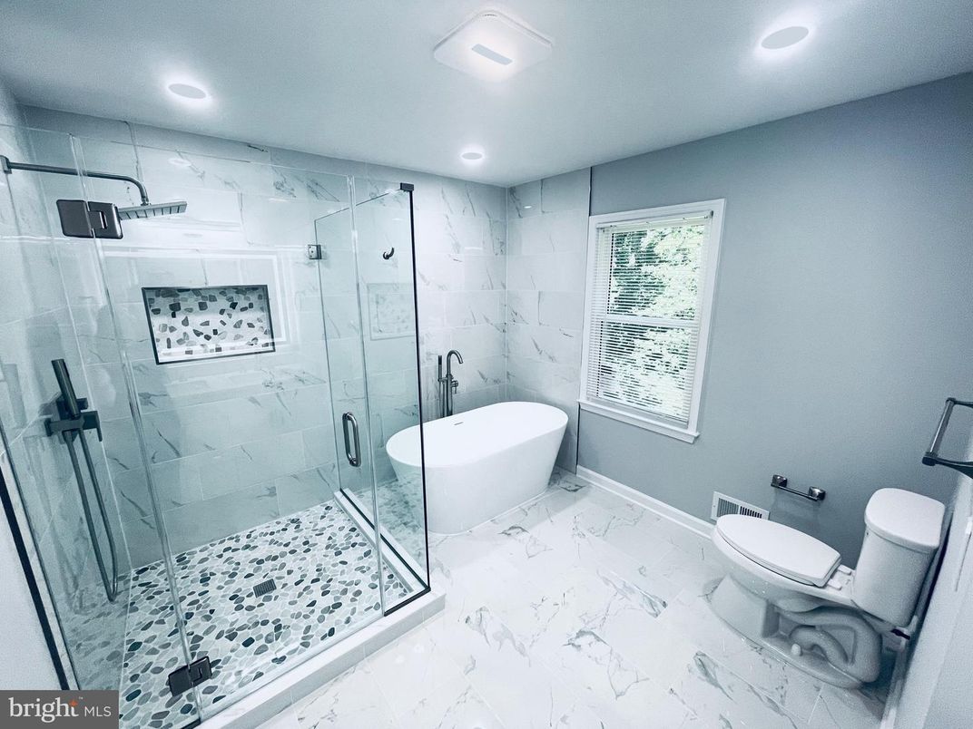 Bathroom, Free Standing Baths, Glass Shower, Interior, Marble, Marble Walls, Recessed Lighting