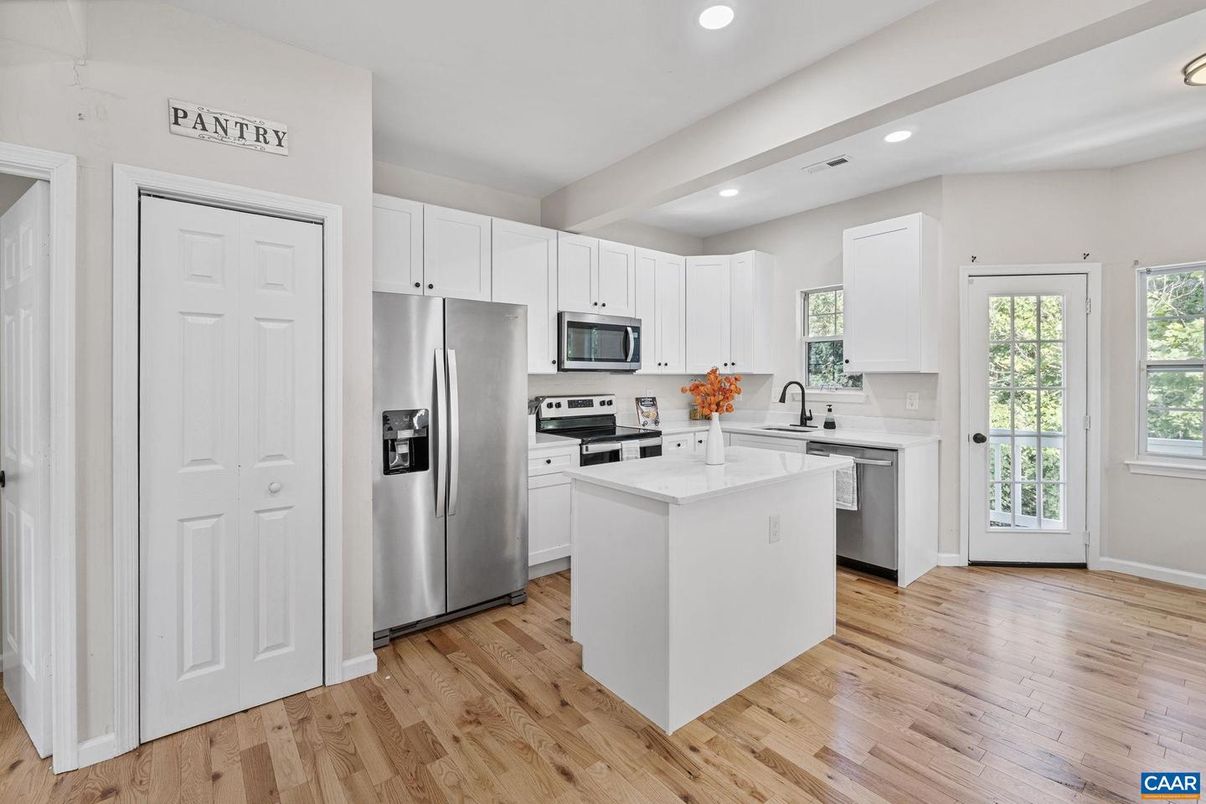 Interior, Kitchen, Recessed Lighting, Stainless Steel Appliances, Wood Texture Flooring