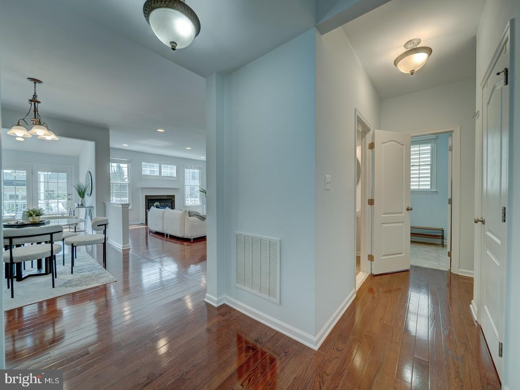 Dining room, Fireplace, Interior, Living room, Pendant Lights, Recessed Lighting, Wood Texture Flooring